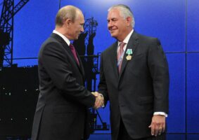 Russian President Vladimir Putin presents ExxonMobil CEO Rex Tillerson with a Russian medal at an award ceremony for heads and employees of energy companies at an economic forum in St Petersburg on 21 June 2012. An aide to President Putin praised US President-elect Donald Trump’s choice of Rex Tillerson to lead the State Department and said that the businessman was well regarded by many Russian officials. Tillerson has now met Putin as Secretary of State, but a meeting between Trump and Putin is yet to take place.