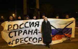 Ukrainian protesters hold a banner reading "no blockade of the Azov Sea!" During a rally in Mariupol, south coast of Azov sea, eastern Ukraine, Wednesday, Nov. 28, 2018. The Cold War may have restarted from the Russian occupation and annexation of Crimea in 2014.