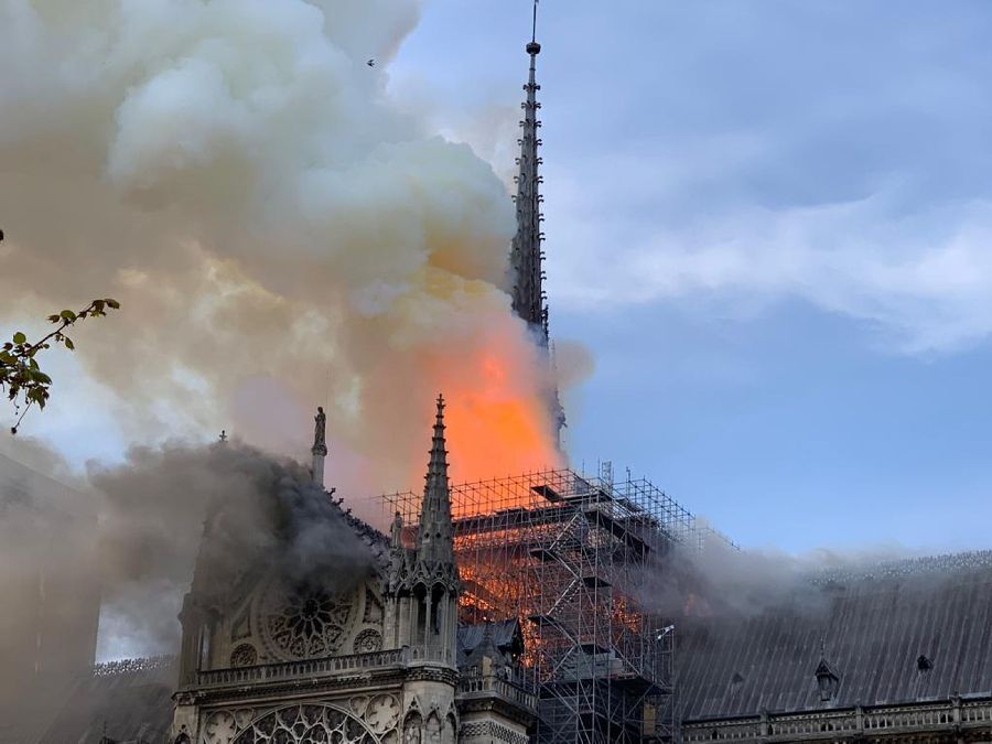 Smoke and flames rise from Notre-Dame cathedral in Paris on 15 April 2019. France’s president, Emmanuel Macron, has pledged to restore the cathedral to its former glory.