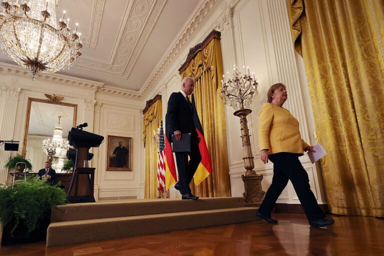 German Chancellor Angela Merkel and US President Joe Biden leave a joint news conference in the White House in July 2021.